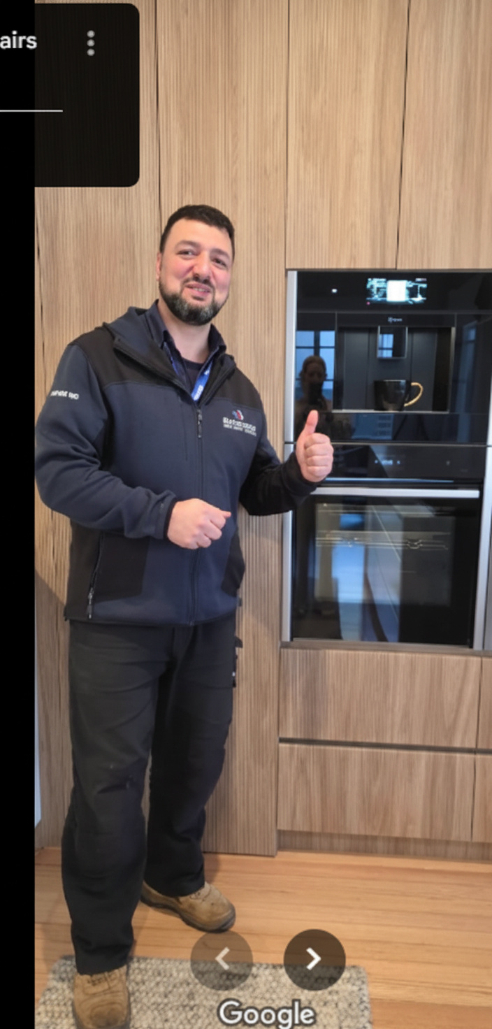 Technician repairing an appliance