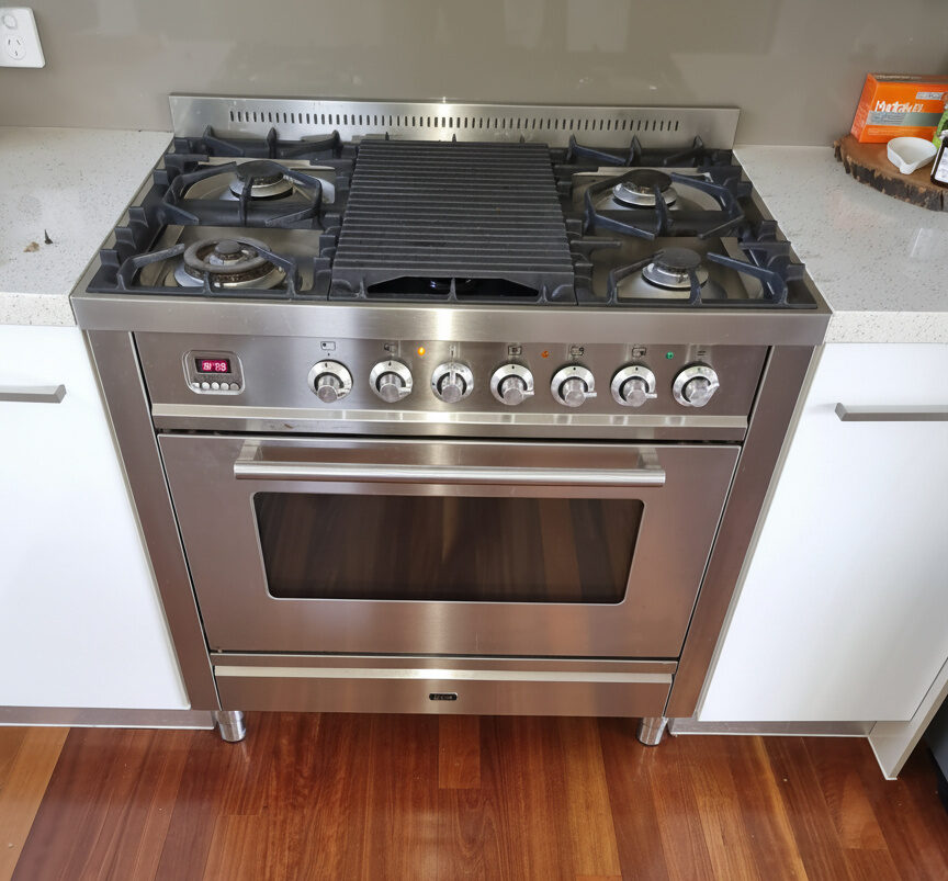 Technician repairing an appliance