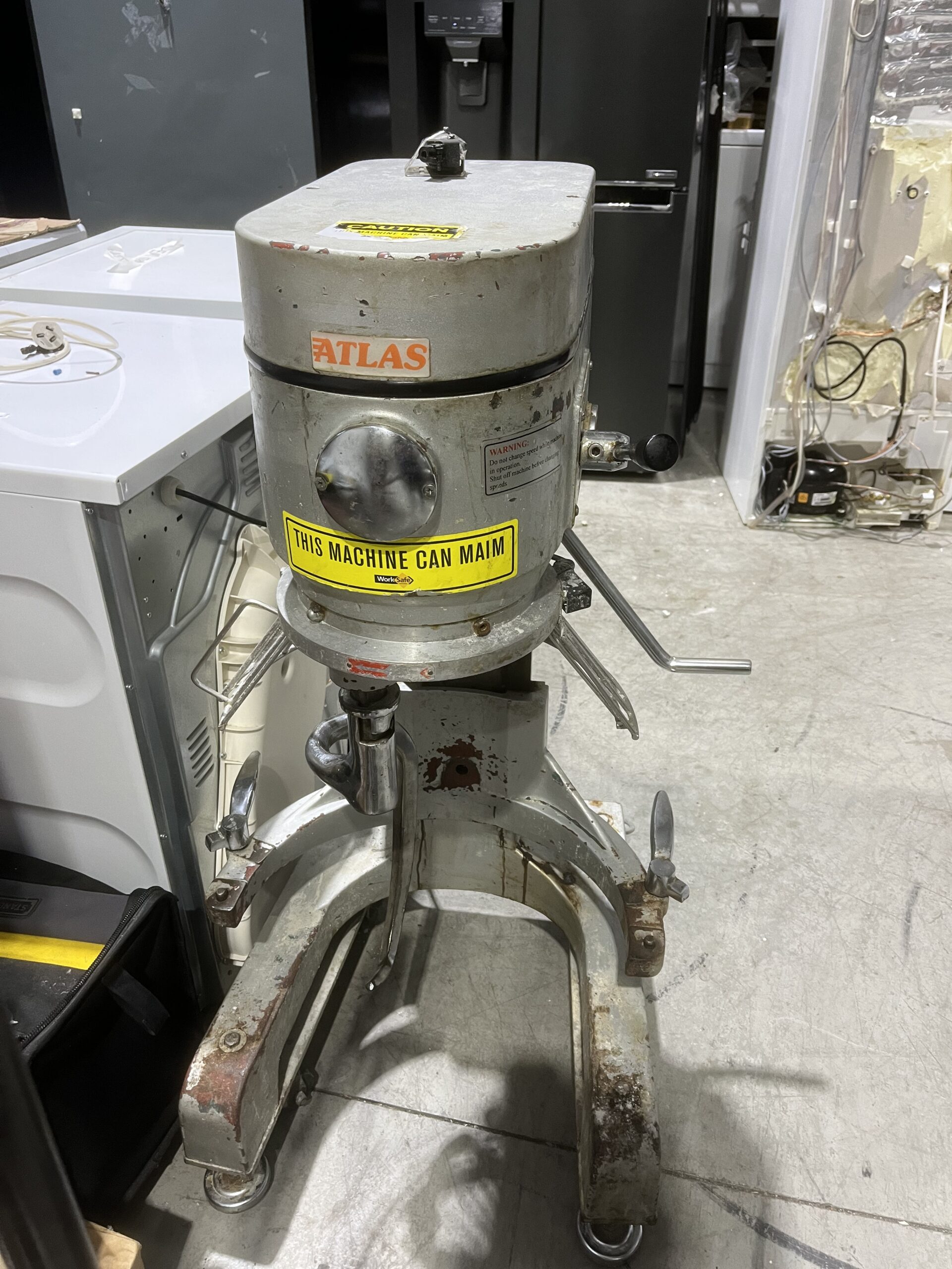 Technician repairing an appliance